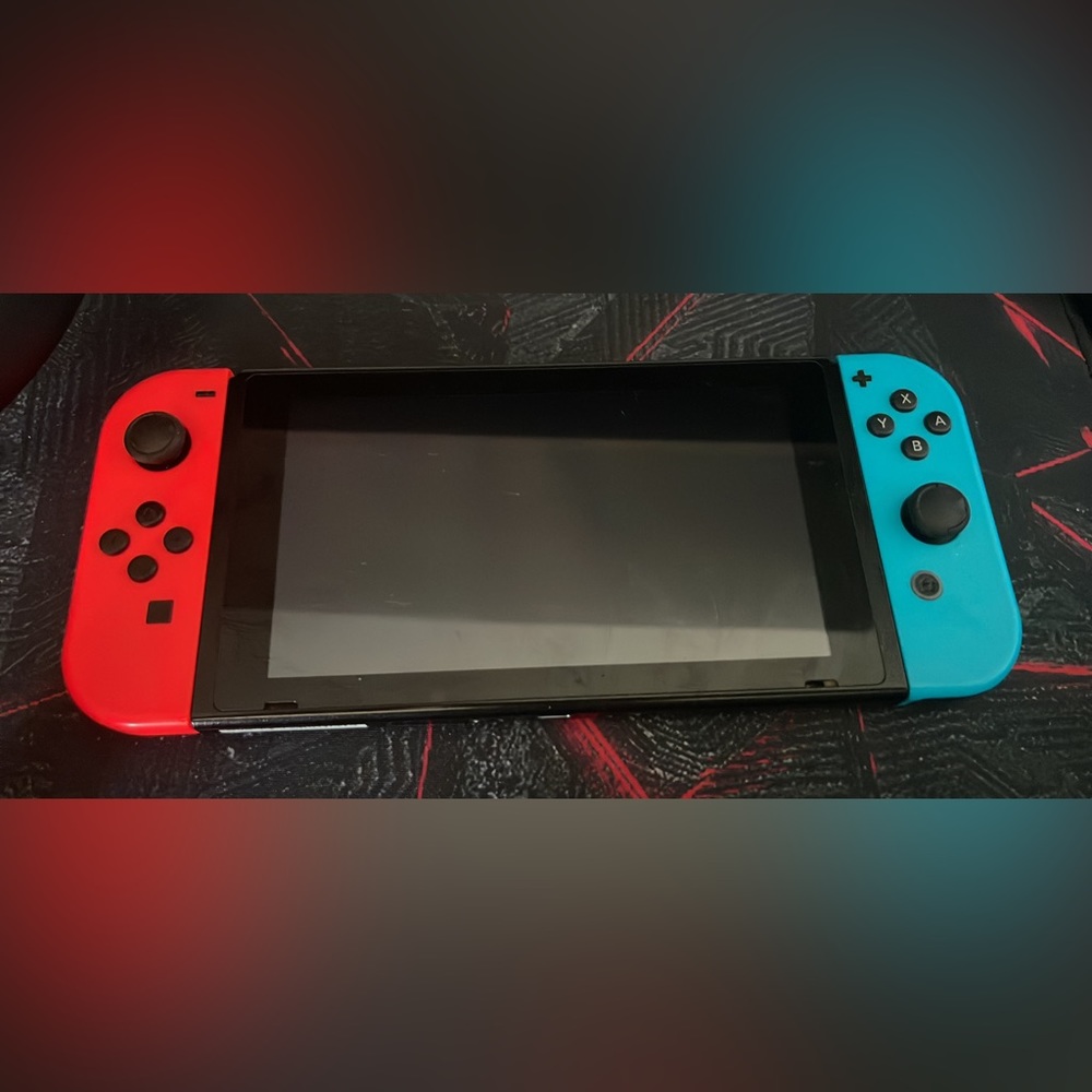 Nintendo switch with four games in the case